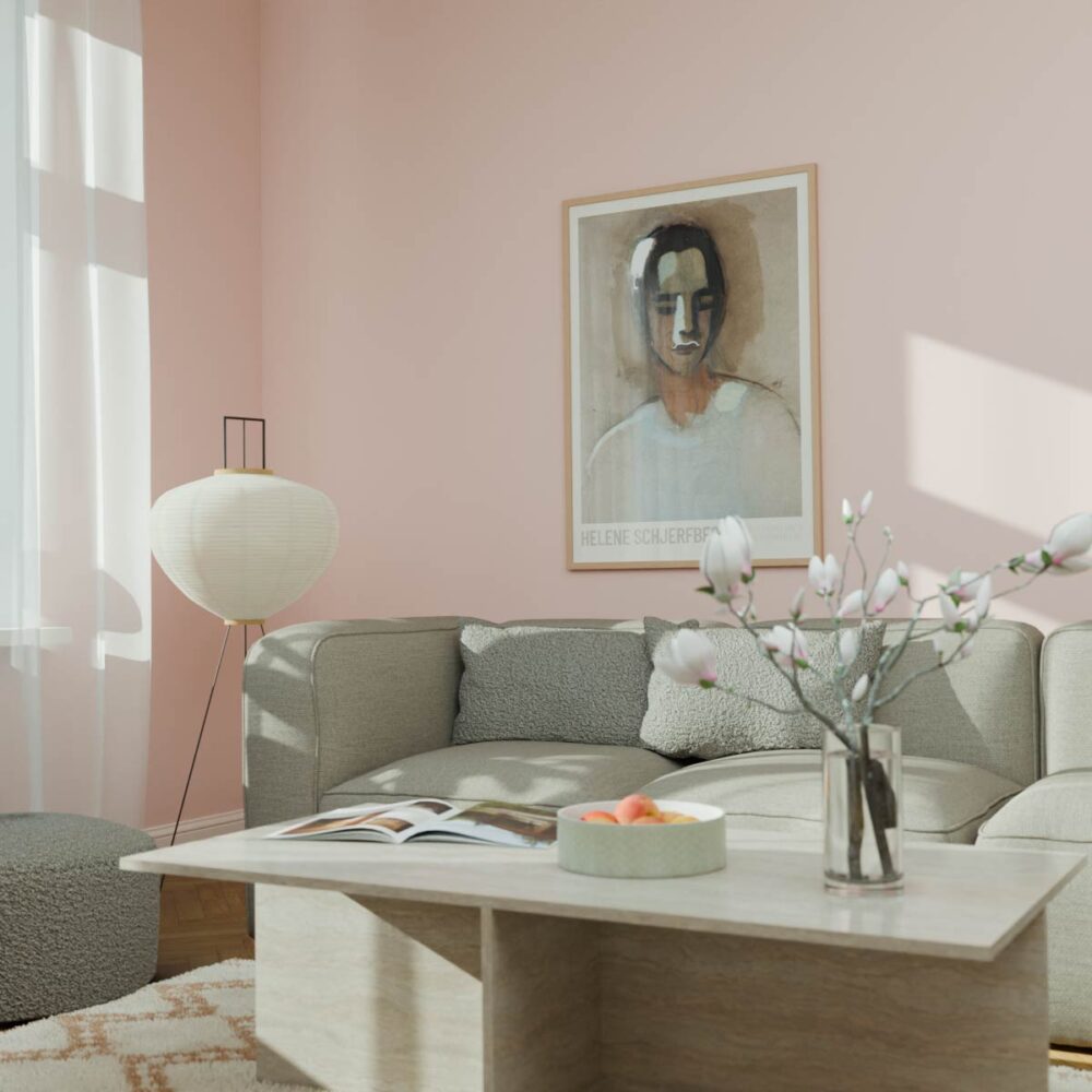 En stilren stue med minimalistiske møbler i lyse farver. Brug puder og tilbehør til at skabe taktile oplevelser.